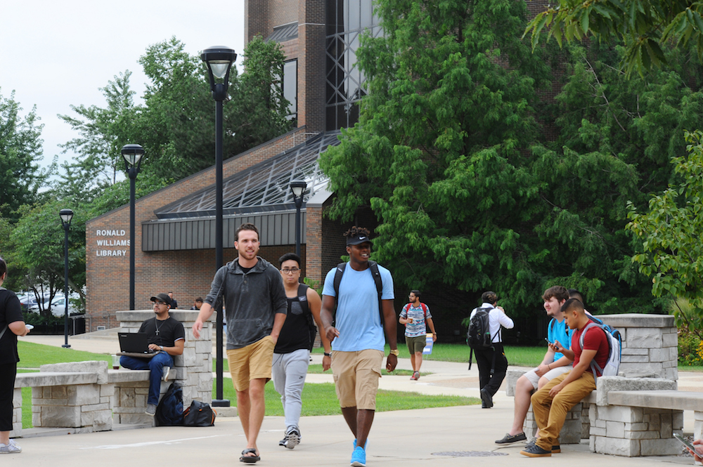 Students walk across the University Commons.