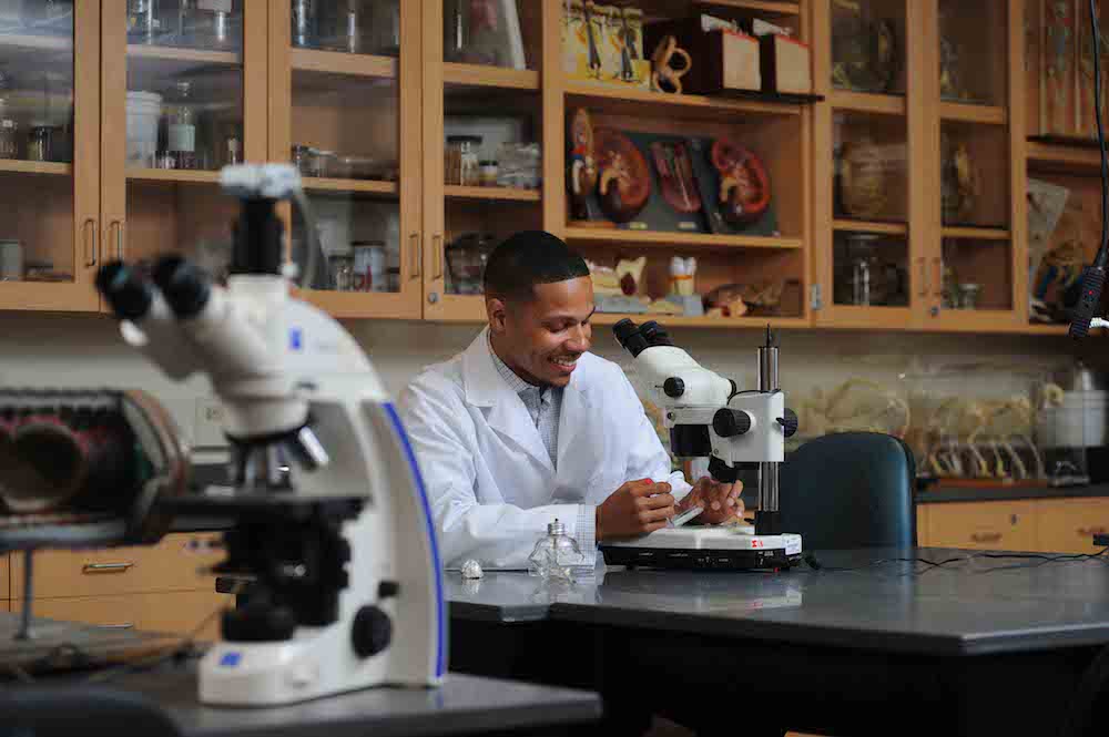 Biology major and McNair Scholar Anthony Smith works in the lab.
