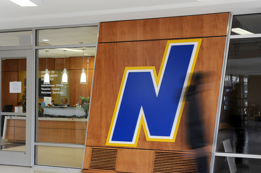 Northeasterns "Flying N" logo at the entrance of Enrollment Services