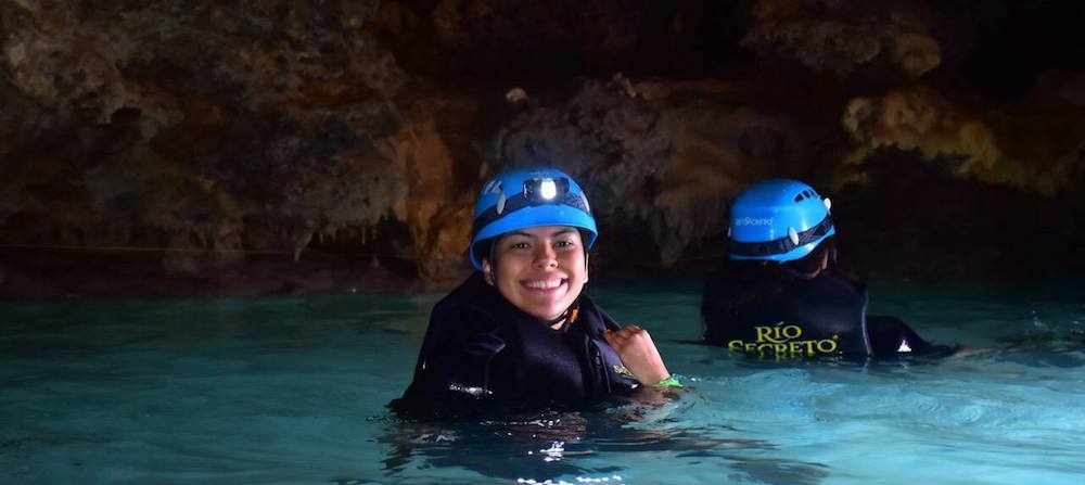Earth Science junior Andrea Saavedra swims in an underground river as part of her research in Mexico