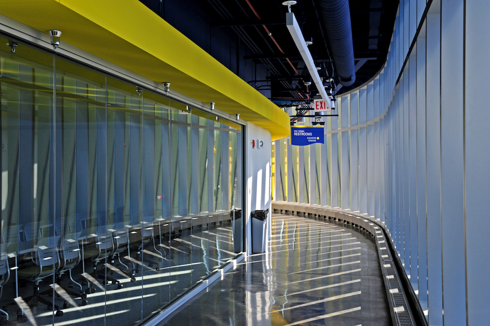 A curving hallway inside the El Centro building