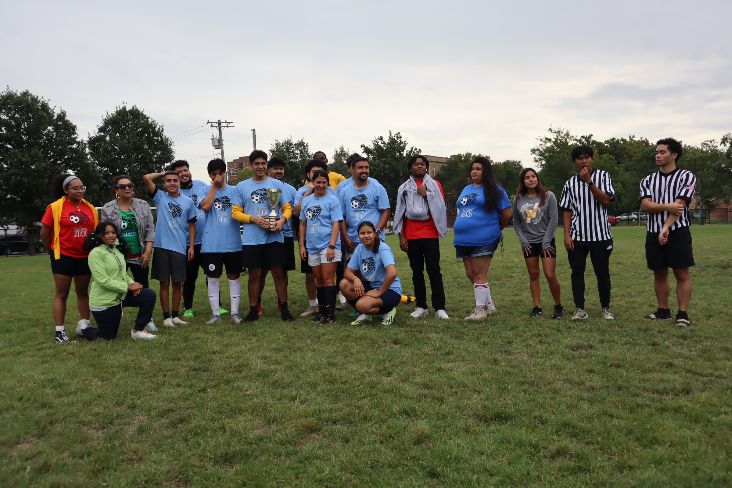 Students posing for a picture after a soccer game