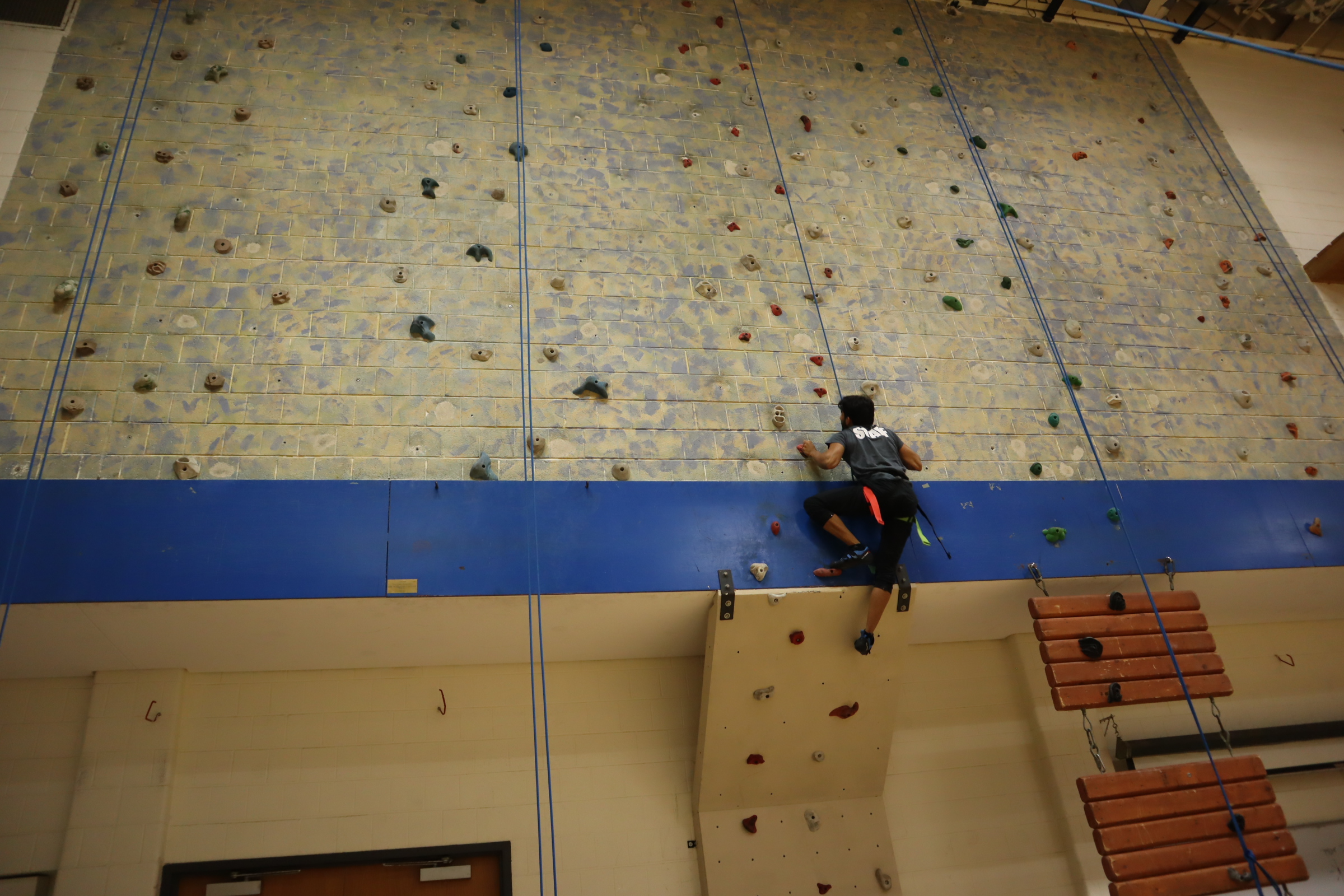 Student rock climbing