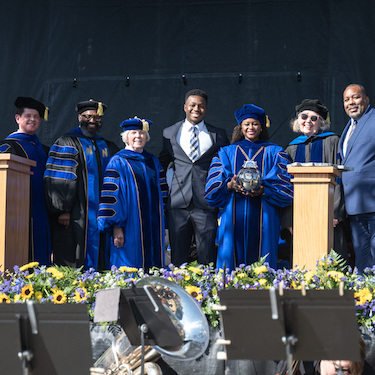 A photo of (from left to right) Dr. R. Shayne Cofer, J. Todd Phillips, President Emeriti Sharon K. Hahs, Bryson Jordan, President Katrina E. Bell-Jordan, President Emeriti Salme Harju Steinberg and Darrell Jordan at Northeastern Illinois University's 2024 Inauguration Ceremony on Oct. 4. 