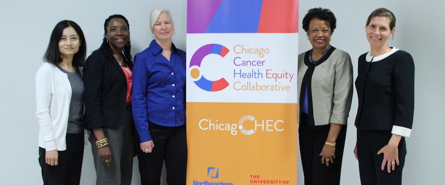 President Gibson and four other women stand next to ChicagoCHEC signage