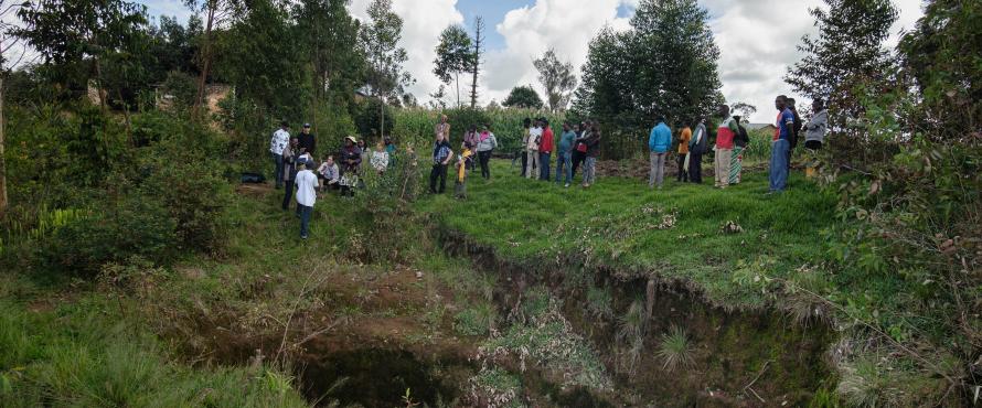 Group visiting a mass grave